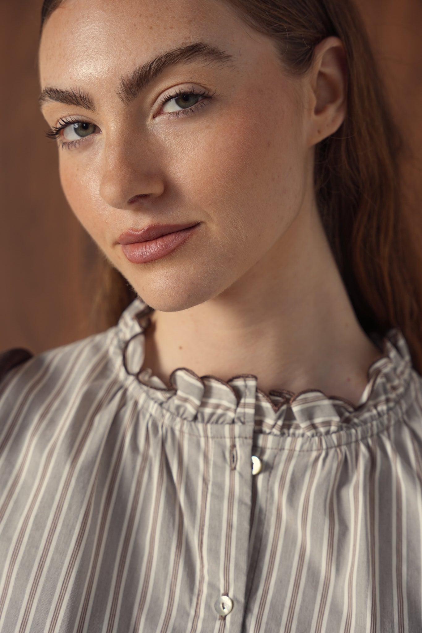 point ruffle blouse